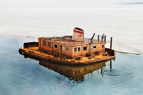 Evgenia Arbugaeva, Stone Skipping from Rusty Barge, 2012